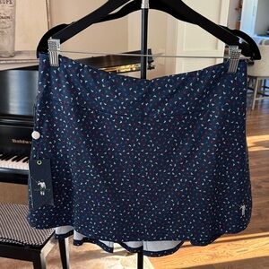 William Murray Golf Navy Mini Skort with Red & White Triangle Print